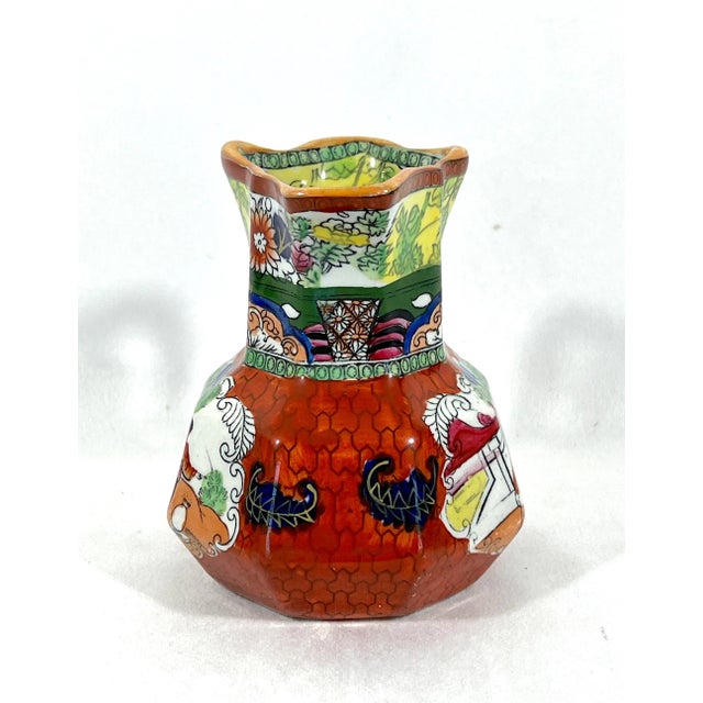 An octagonal Chinoiserie jug with a green Hydra handle. This jug has one of the sought after Chinoiserie patterns with...