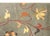 A chic late 20th century Tibetan hand-knotted rug with a gray background and an all-over scrolling vine and stylized...