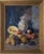 Signed framed still life oil on canvas of exotic mediterranean fruit with a vase. Artist name: signed (unidentified at...