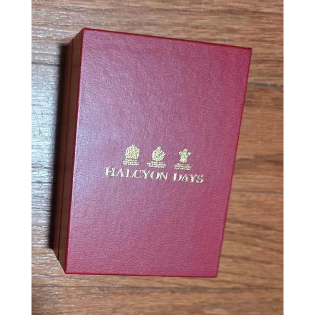 This enchanting Halcyon Days enamel box celebrates the magic of Christmas 2019. Nestled in a luxurious red presentation...