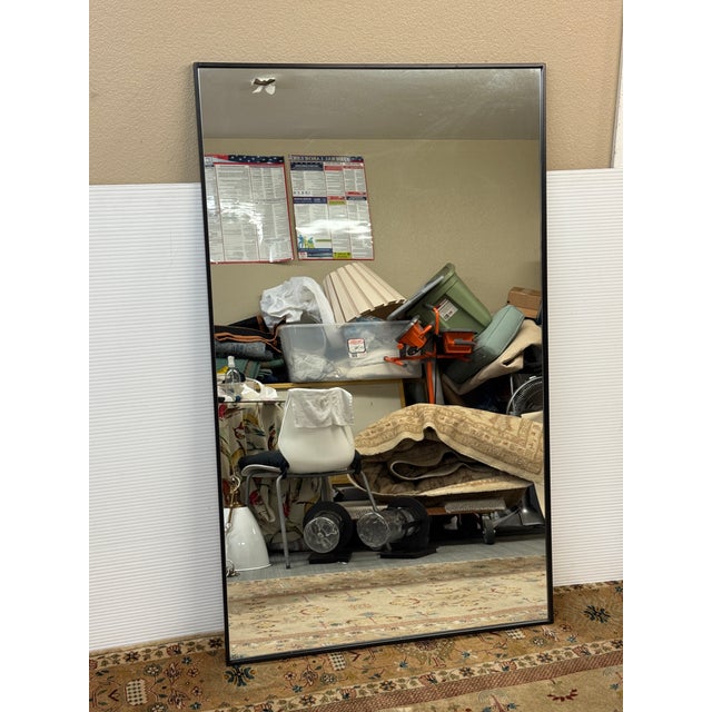 Design Plus Gallery presents the Black Eternity Mirror from Elegant Lighting. The slim black metal frame provides a bold...