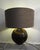 Elegant Murano table lamp from the 1980s by Cenedese in a classic round spherical shape. Artfully handcrafted from brown-...