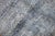 An early 21st Century Moroccan rug in gray and blue. The wool is lustrous and soft and cozy on the feet Measures: 7'6'' x...