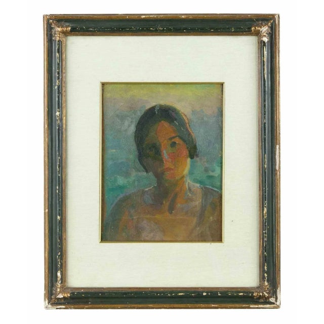 Feminine Figure is a modern artwork realized by Roberto Melli in 1930s. Mixed colored oil painting. Includes vintage frame...