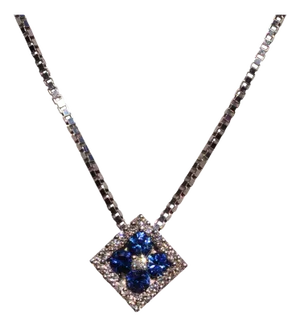 The 135th Street: Sapphire and Diamond Halo Necklace in White Gold