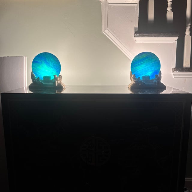 An extraordinary, highly collectible matching pair of genuine 1920s–1930s Art Deco figural accent lamps. The sculptural...