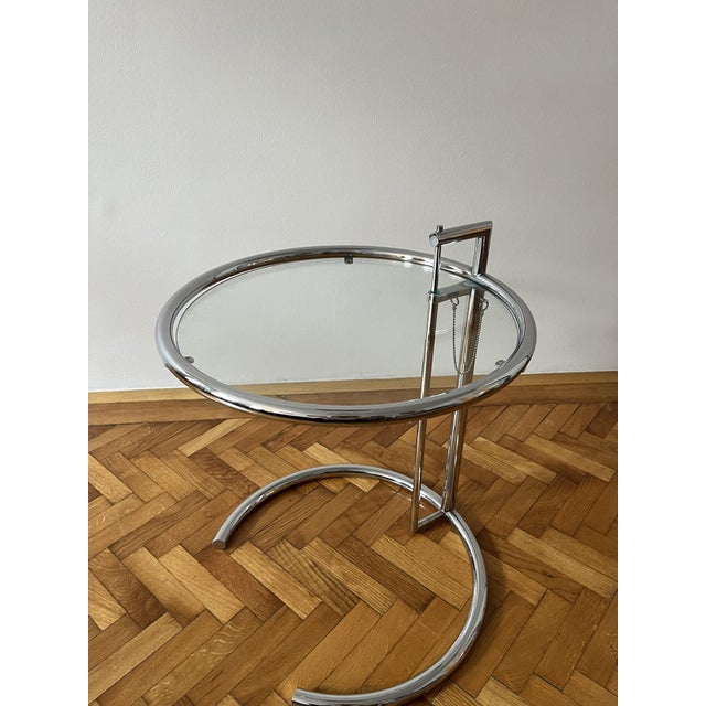 E1027 Adjustable Side Table by Eileen Gray for Classicon, in Flawless conditions. Designed 1920 to 1949 This piece has an...