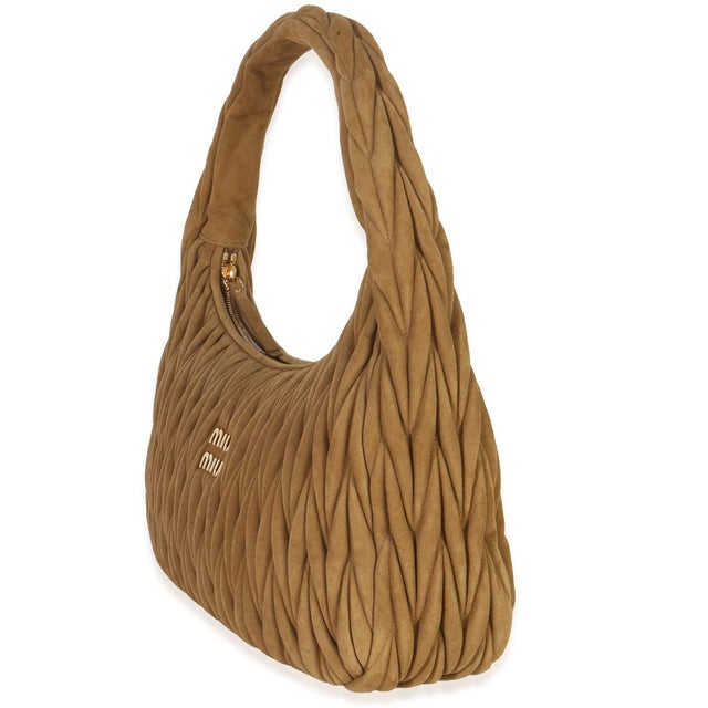 Item #: Z151726 Interior Material: Fabric MSRP: 4,100 Features Interior: 1 slip pocket. 1 zip pocket. Dimensions: 13 x 9.5...