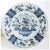 DETAILS An antique Dutch Delft faience plate with an elaborate floral basket arrangement in the center. It is bordered by...
