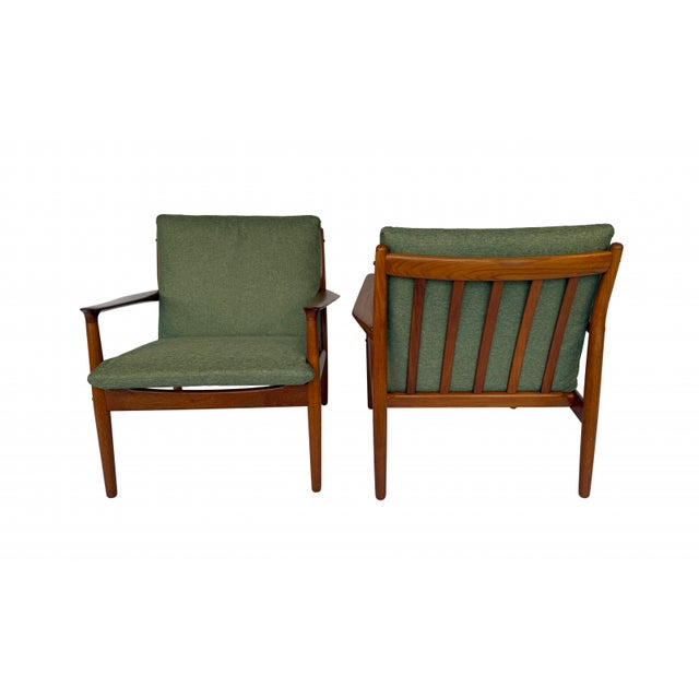 This pair of model GM-5 Danish lounge chairs was designed by Svend Aage Eriksen for Glostrup Mobelfabrik in the 1960s. The...