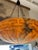 c. 1930s, translucent reddish alabaster stone bowl suspended by 3 chains to canopy, one hanging socket, 31.5"h x 16"w x 16"d