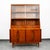 Mid Century Modern display hutch / china cabinet in walnut. This piece was created and sold by Garrison Furniture, Cir,...