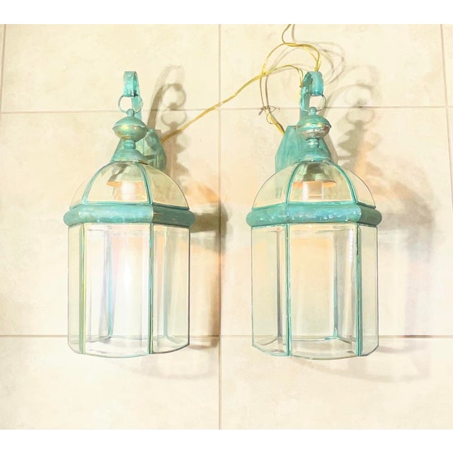 Add a touch of classic charm to your outdoor space with this pair of vintage brass lanterns. These meticulously crafted...