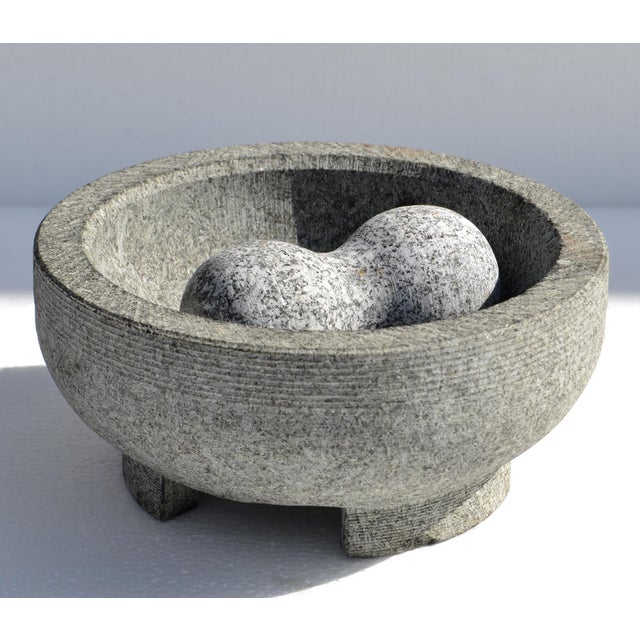 For Sale a stone mortar and pestle allows for manual grinding and crushing, which preserves the natural flavors and aromas...