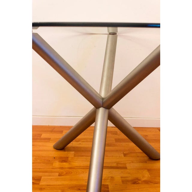 Italian Smoked Glass and Chromed Steel Dining Table, 1970s, in Very Good conditions. Designed 1970 to 1979