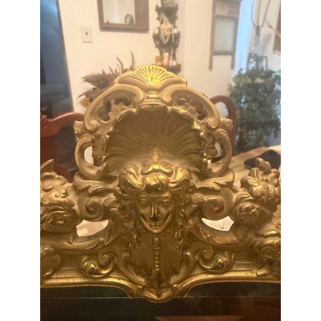 Offered for sale is a stunning ornate antique/vintage Rococo-style tabletop mirror featuring an exceptionally elaborate...