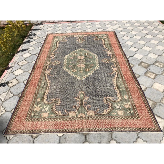 Beautiful vintage Turkish Carpet rug is around 70 years old and in very good condition. This Carpet was hand-woven in the...
