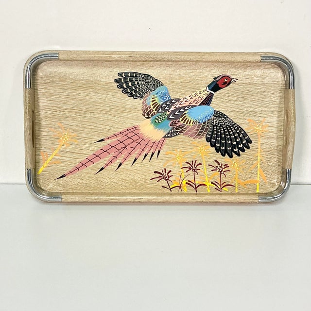 This is a Cerused Oak wooden tray from the 1960s with metal corners and slotted side handles. The design is a hand-painted...