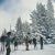 Skiing in vail (1964) limited estate stamped - grande xl (photo by slim aarons) a group of skiers standing next to snow-...