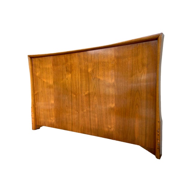 Catch some Z’s with this simple, yet elegant vintage mid century headboard. At 59.5” wide it’s most likely intended for a...
