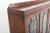 A superb-quality mahogany glazed four-door side cabinet, combining elegant proportions with beautifully executed carved...