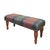 Meticulously handcrafted in the United Kingdom, this upholstered stool boasts classic studding and hand-polished solid...