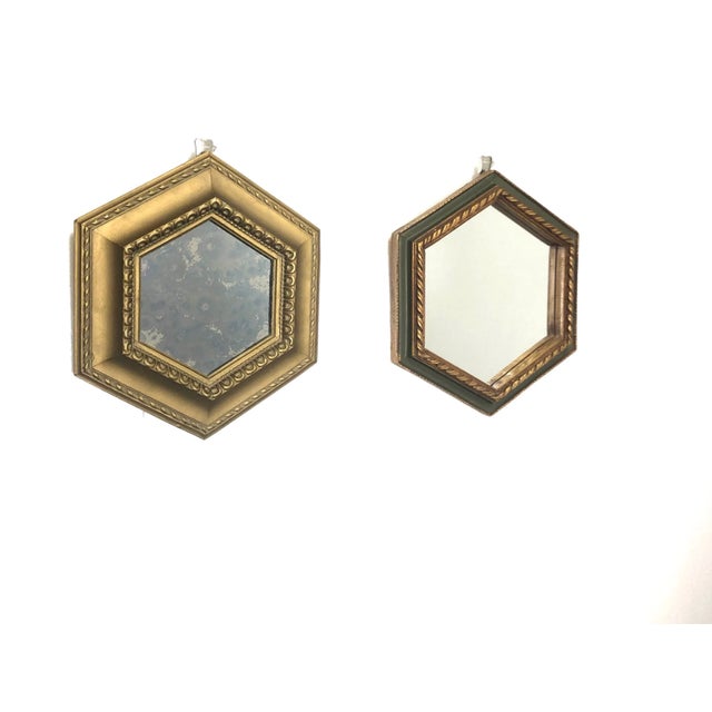 Wonderful vintage gold painted solid wood framed mirror with a mottled, antique mirrored glass. Belart 1970. DIMENSIONS:...