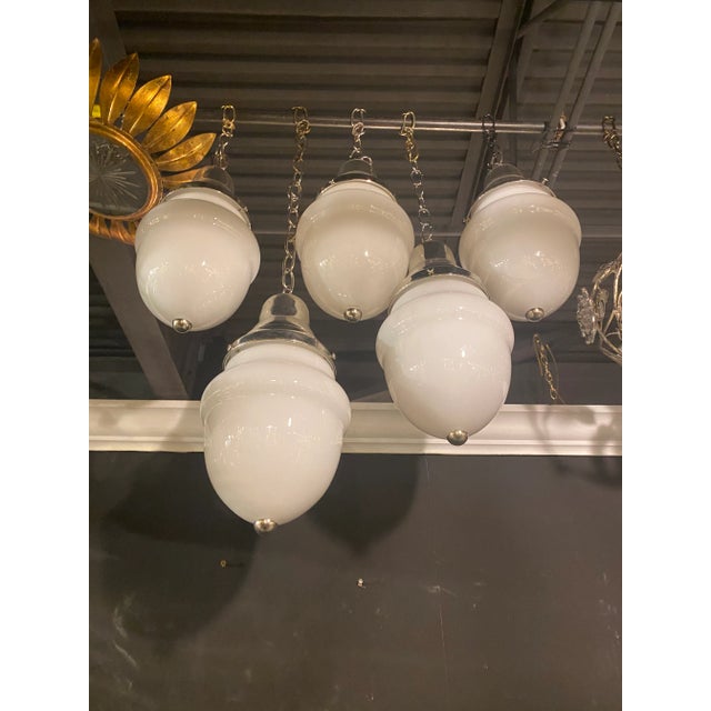 A circa 1930’s French Opaline glass small lantern with nickel-plated hardware interior lights