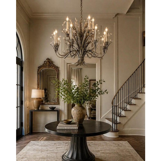 A striking and highly sculptural "Plume" chandelier designed and manufactured in New York City by Remains Lighting in...
