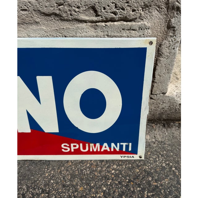 Old enameled iron sign from the 1960s for Cinzano, a historic Italian brand for the production of sparkling wines and...