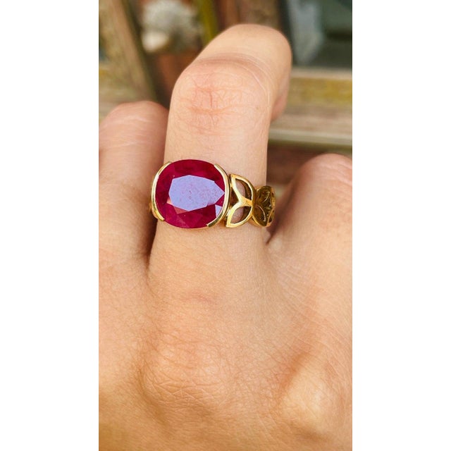 This is part of Chairish’s Fine Jewelry assortment. Oval Cut Ruby Cocktail ring in 18K Gold which perfectly goes with your...