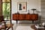 Dating to the 1960s, this Danish modern Brazilian rosewood credenza by Knud Nielsen for Losning Mobelfabrik showcases the...