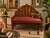 Charming art deco sunburst wooden bench with nicely upholstered cushion. The book matched walnut veneer, sunburst back,...