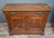 Louis-philippe period buffet in solid walnut, 19th century. an elegant storage unit with clean, balanced lines, opening at...