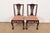 An outstanding pair of Chippendale or Georgian style side chairs or dining chairs In the manner of Baker Furniture USA,...