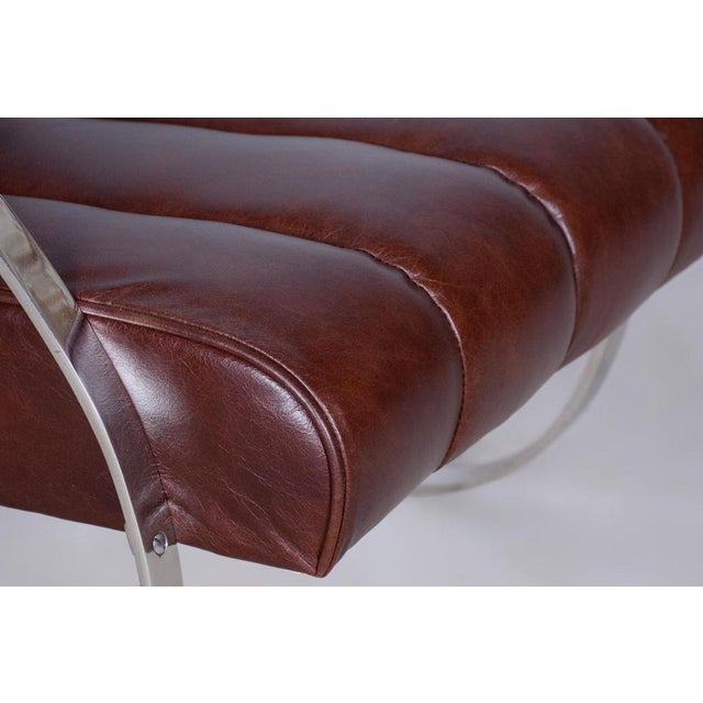 This restored pair of armchairs showcases a unique blend of materials and design. The original traditional upholstery has...