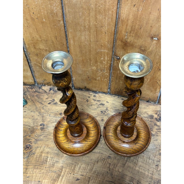 This pair of vintage English oak barley twist candlestick holders carries the quiet drama of candlelit rooms and evenings...