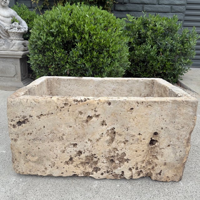 Antique Limestone Trough A one-of-a-kind hand-carved limestone trough naturally textured, lightly weathered finish....