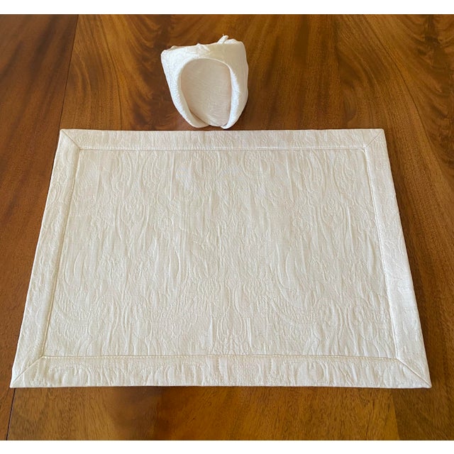 Waterford Vintage Beige Placemats and Napkins Set of Five. The placemat measures. 17 3/4 inches in width and 12 1/2 inches...