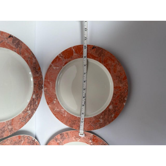 Set of 4 Villeroy & Boch Siena 10.5" Dinner Plates. These elegant plates feature a sophisticated salmon marble rim on...