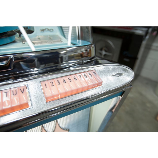 Refurbished Rock-Ola Regis 200 Jukebox An iconic jukebox from the American brand Rock-Ola, this 1961 model was one of only...