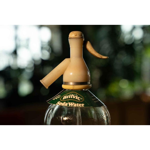 Hunts seltzer siphon. Glass bottle, plastic nozzle. In excellent condition. I believe it can still be used, but has not...