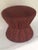 Ruben De Saavedra designed hourglass stool with oxblood red and black leather-embossed cotton upholstery and brass...