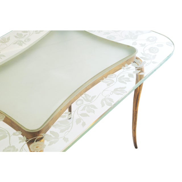 This unique coffee table, designed by Giovanni Gariboldi and published by Fontana Arte, is a true embodiment of elegance...