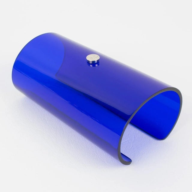 This stunning Courreges Paris massive bangle bracelet features an oversized cuff design in transparent cobalt blue resin...