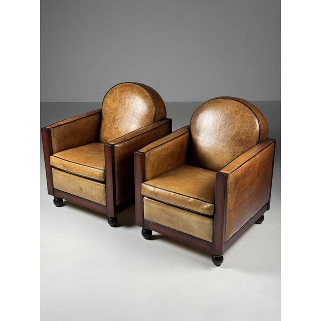 Set of two Art Deco-style club armchairs. In exceptionally good condition! Upholstered in high-quality sheepskin. Made by...