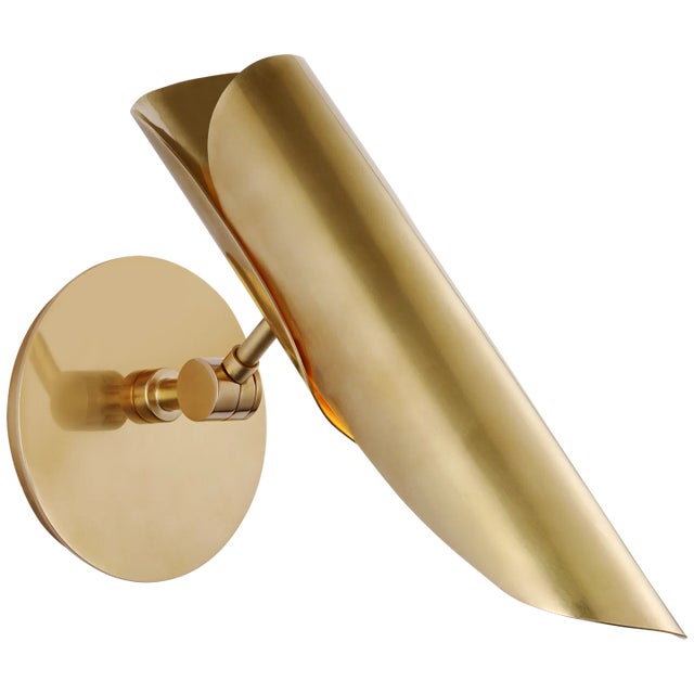 Flore Single Wall Light in Soft Brass Designer: Champalimaud Height: 10" - 12.75" Extension: 6.5" - 10" Backplate: 4.75"...