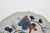 Late 18th-early 19th century lobed Arita plate, Japan. Decorated with grape clusters, vines & a butterfly. 8.25" dia. x 1...