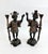 This stunning pair of vintage Mid-Century bronze figural candlesticks are crafted with exceptional texture and detail. The...