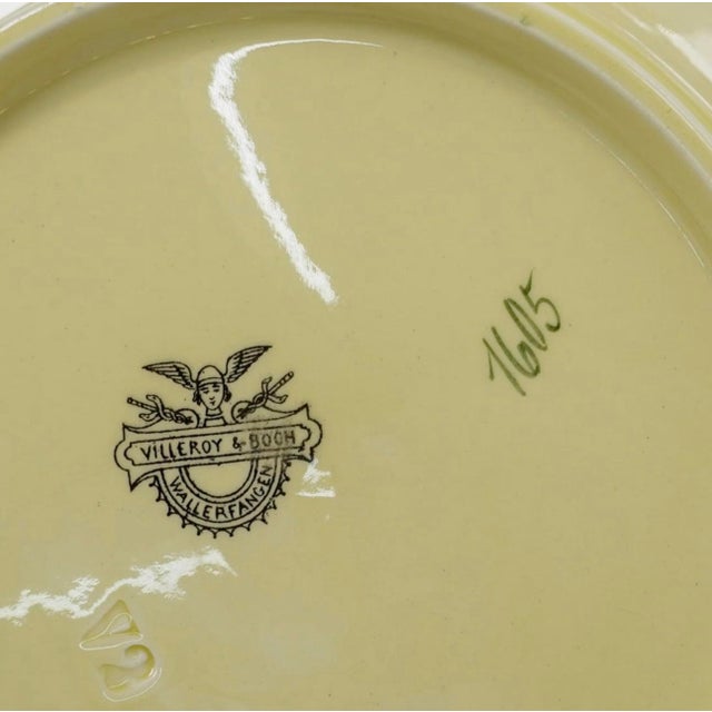 Beautiful antique plate from the 1874-1909 era featuring a village harbor scene. Rare coloring, often called yellow and...